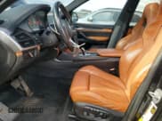 ✅ 2016 BMW X5 M • VIN: 5YMKT6C58G0R77723 • Lot: 80561645. Listed on Copart with 123,947 mi. Free auction sales archive from the USA and detailed vehicle history report at DreamBid. Image 7.