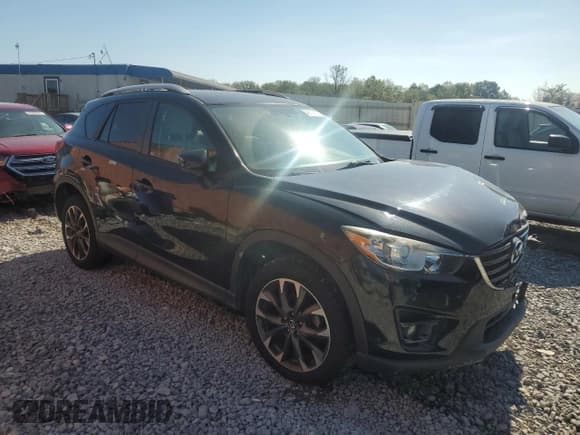 ✅ 2016 Mazda CX-5 Grand Touring • VIN: JM3KE2DY1G0816741 • Lot: 86114115. Wystawiony na Copart z przebiegiem 93 046 mil. Bezpłatny archiwum sprzedaży aukcyjnych z USA i szczegółowy raport historii pojazdu na DreamBid. Zdjęcie 4.