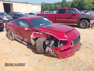 ✅ 2021 Ford Mustang GT • VIN: 1FA6P8CFXM5154069 • Lot: 42671232. Listed on IAAI with 25,250 mi. Free auction sales archive from the USA and detailed vehicle history report at DreamBid. Image 1.