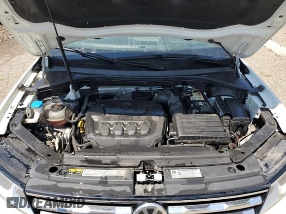 ✅ 2018 Volkswagen Tiguan SEL • VIN: 3VV2B7AX4JM199917 • Лот: 82122345. Опубликован ранее на Copart с пробегом 96 442 миль. Бесплатный доступ к архиву аукционных продаж из США и подробный отчёт об истории автомобиля на DreamBid. Изображение 12.