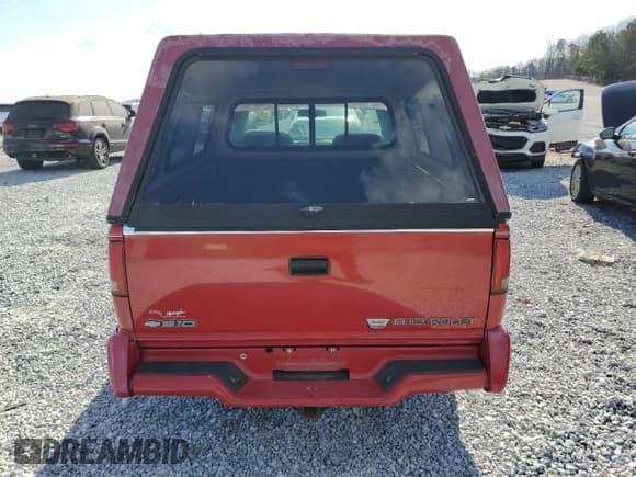 ✅ 1996 Chevrolet S-10 • VIN: 1GCCS14X2TK112862 • Лот: 87328404. Опубликован ранее на Copart с пробегом 74 417 миль. Бесплатный доступ к архиву аукционных продаж из США и подробный отчёт об истории автомобиля на DreamBid. Изображение 6.