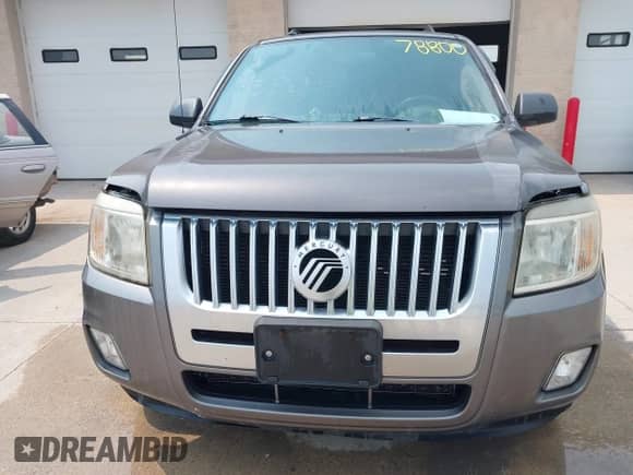 2010 Mercury Mariner with VIN 4M2CN8B78AKJ16635, listed as a IAAI auction lot 42878800 with 189,401 mi miles and . Bid and sale history available at DreamBid. Image 6.