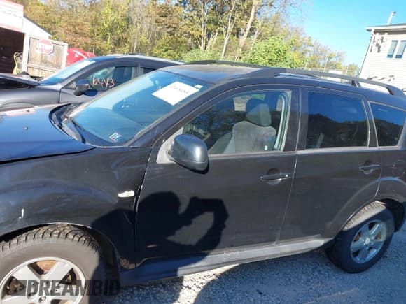 ✅ 2010 Mitsubishi Outlander ES • VIN: JA4AT2AW6AZ002403 • Lot: 43448485. Listed on IAAI with 114,340 mi. Free auction sales archive from the USA and detailed vehicle history report at DreamBid. Image 14.