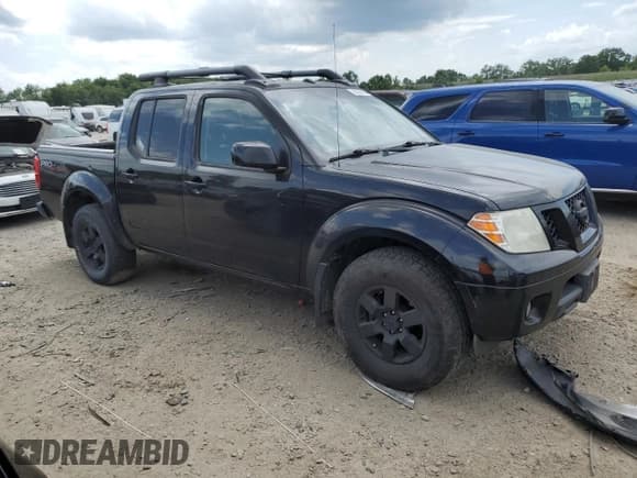 ✅ 2010 Nissan Frontier Pro-4X • VIN: 1N6AD0EV7AC417173 • Lot: 65851905. Listed on Copart with 184,667 mi. Free auction sales archive from the USA and detailed vehicle history report at DreamBid. Image 4.