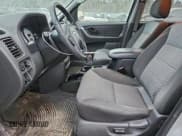 ✅ 2003 Ford Escape XLT Popular 2 • VIN: 1FMYU93133KB85553 • Lot: 95891575. Listed on Copart with 130,488 mi. Free auction sales archive from the USA and detailed vehicle history report at DreamBid. Image 7.