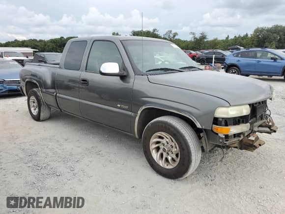 2002 Chevrolet Silverado 1500 LS z VIN 2GCEC19T921344756, wystawiony jako Copart lot #72798354 z przebiegiem 157 700 mil mil oraz Szkoda całkowita • Salvage title. Historia ofert i sprzedaży dostępna na DreamBid. Obrazek 4.