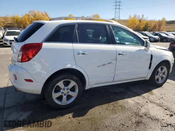 2014 Chevrolet Captiva Sport LTZ с VIN 3GNAL4EK9ES568574, выставлен на аукционе Copart как лот 77491504 с пробегом 155 539 миль миль и Списание • Salvage title. История ставок и продаж доступна на DreamBid. Изображение 3.