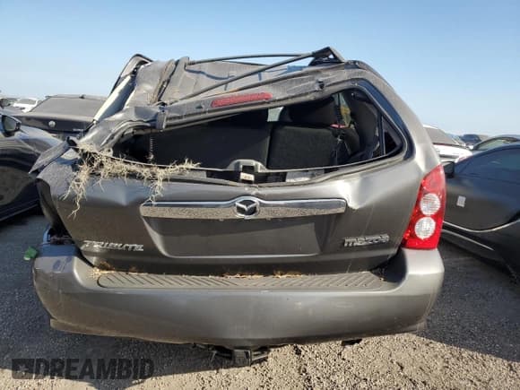 ✅ 2005 Mazda Tribute S • VIN: 4F2CZ96145KM43450 • Lot: 76189794. Wystawiony na Copart z przebiegiem Nie podano. Bezpłatny archiwum sprzedaży aukcyjnych z USA i szczegółowy raport historii pojazdu na DreamBid. Zdjęcie 6.