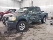 ✅ 2004 Nissan Titan LE • VIN: 1N6AA07B14N511618 • Lot: 41336419. Listed on IAAI with 195,863 mi. Free auction sales archive from the USA and detailed vehicle history report at DreamBid. Image 2.