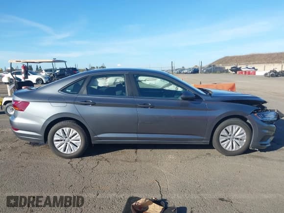 ✅ 2019 Volkswagen Jetta S • VIN: 3VWC57BU4KM105547 • Лот: 43651941. Опубликован ранее на IAAI с пробегом 164 530 миль. Бесплатный доступ к архиву аукционных продаж из США и подробный отчёт об истории автомобиля на DreamBid. Изображение 14.