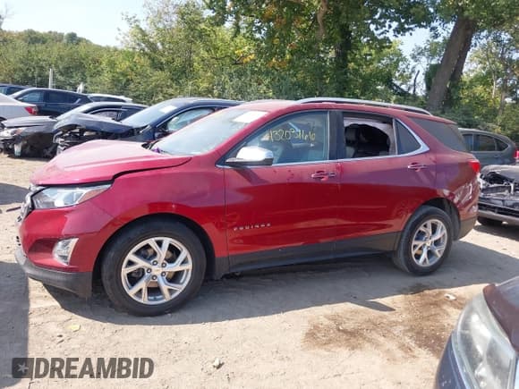 ✅ 2019 Chevrolet Equinox Premier • VIN: 2GNAXNEV4K6148056 • Lot: 43203166. Listed on IAAI with 66,972 mi. Free auction sales archive from the USA and detailed vehicle history report at DreamBid. Image 14.