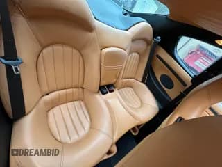 ✅ 2004 Maserati Coupe • VIN: ZAMBC38A840011845 • Lot: 55761615. Wystawiony na Copart z przebiegiem 49 017 mil. Bezpłatny archiwum sprzedaży aukcyjnych z USA i szczegółowy raport historii pojazdu na DreamBid. Zdjęcie 6.