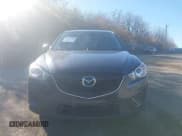 ✅ 2015 Mazda CX-5 Sport • VIN: JM3KE4BY6F0499357 • Lot: 43817789. Listed on IAAI with 155,042 mi. Free auction sales archive from the USA and detailed vehicle history report at DreamBid. Image 6.