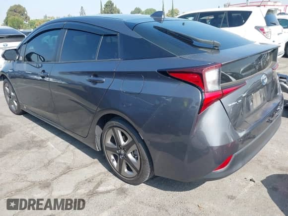 2022 Toyota Prius L Eco z VIN JTDKAMFU8N3173343, wystawiony jako IAAI lot #43008600 z przebiegiem 46 161 mil mil oraz . Historia ofert i sprzedaży dostępna na DreamBid. Obrazek 3.