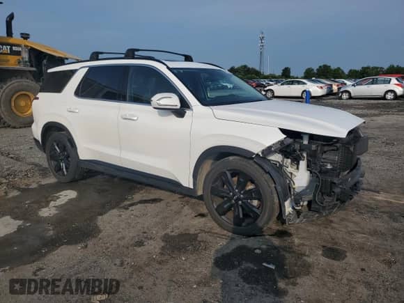 2023 Hyundai Palisade XRT с VIN KM8R3DGE1PU574841, выставлен на аукционе Copart как лот 64822714 с пробегом 69 706 миль миль и Списание • Salvage title. История ставок и продаж доступна на DreamBid. Изображение 4.