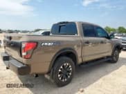 ✅ 2021 Nissan Titan SL • VIN: 1N6AA1ED9MN514521 • Lot: 70016785. Wystawiony na Copart z przebiegiem 63 766 mil. Bezpłatny archiwum sprzedaży aukcyjnych z USA i szczegółowy raport historii pojazdu na DreamBid. Zdjęcie 3.