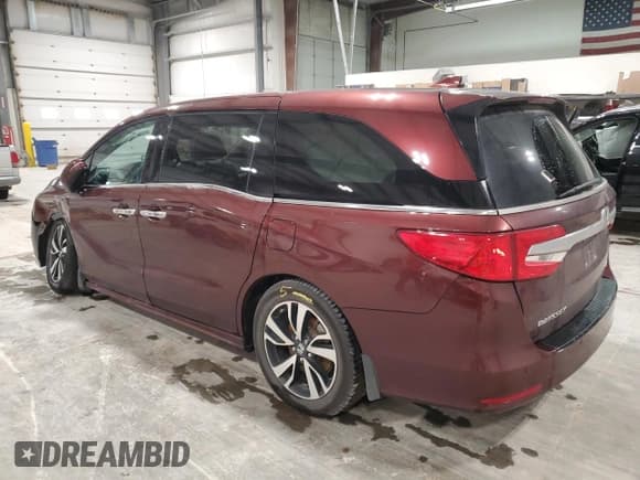 ✅ 2018 Honda Odyssey Elite • VIN: 5FNRL6H98JB068862 • Lot: 82268675. Listed on Copart with 101,436 mi. Free auction sales archive from the USA and detailed vehicle history report at DreamBid. Image 2.
