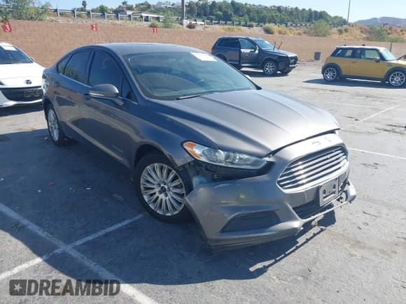 ✅ 2013 Ford Fusion SE Hybrid • VIN: 3FA6P0LU9DR361940 • Лот: 43215900. Опубликован ранее на IAAI с пробегом 236 769 миль. Бесплатный доступ к архиву аукционных продаж из США и подробный отчёт об истории автомобиля на DreamBid. Изображение 1.