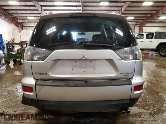 ✅ 2010 Mitsubishi Outlander LS • VIN: JA4JT3AX4AZ601735 • Lot: 83313844. Wystawiony na Copart z przebiegiem 96 444 mil. Bezpłatny archiwum sprzedaży aukcyjnych z USA i szczegółowy raport historii pojazdu na DreamBid. Zdjęcie 6.