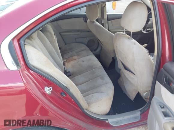 ✅ 2008 Kia Optima LX • VIN: KNAGE123385258103 • Лот: 43509138. Опубликован ранее на IAAI с пробегом 182 266 миль. Бесплатный доступ к архиву аукционных продаж из США и подробный отчёт об истории автомобиля на DreamBid. Изображение 8.