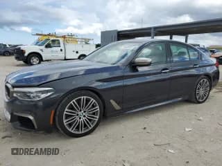 ✅ 2018 BMW 5 Series M550i xDrive • VIN: WBAJB9C53JB286164 • Лот: 71052315. Опубликован ранее на Copart с пробегом 91 157 миль. Бесплатный доступ к архиву аукционных продаж из США и подробный отчёт об истории автомобиля на DreamBid. Изображение 1.