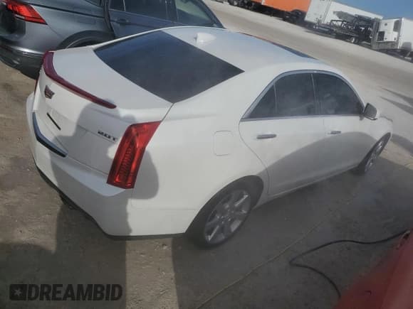 ✅ 2016 Cadillac ATS Standard AWD • VIN: 1G6AG5RX3G0106727 • Lot: 76285794. Listed on Copart with 71,974 mi. Free auction sales archive from the USA and detailed vehicle history report at DreamBid. Image 3.