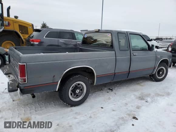 1986 Chevrolet S-10 X96 с VIN 1GCCS14R1G2211437, выставлен на аукционе Copart как лот 88146645 с пробегом 143 797 миль миль и Списание • Salvage title. История ставок и продаж доступна на DreamBid. Изображение 3.