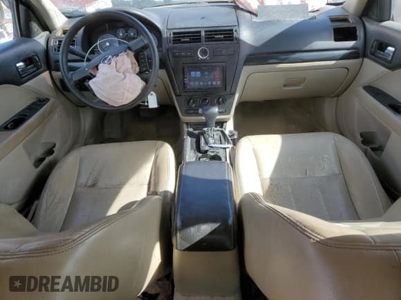 ✅ 2007 Mercury Milan • VIN: 3MEHM07Z17R670483 • Лот: 52942355. Опубликован ранее на Copart с пробегом 231 784 миль. Бесплатный доступ к архиву аукционных продаж из США и подробный отчёт об истории автомобиля на DreamBid. Изображение 8.