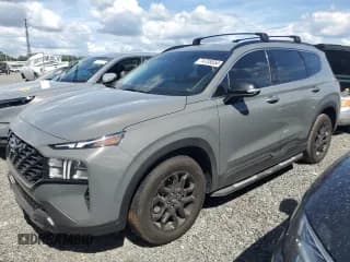 ✅ 2023 Hyundai Santa Fe XRT • VIN: 5NMS64AJ6PH630055 • Lot: 74735554. Wystawiony na Copart z przebiegiem Nie podano. Bezpłatny archiwum sprzedaży aukcyjnych z USA i szczegółowy raport historii pojazdu na DreamBid. Zdjęcie 1.