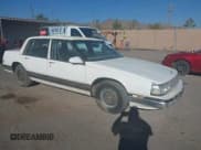 ✅ 1990 Buick Park Avenue • VIN: 1G4CW54C0L1603179 • Lot: 43066942. Wystawiony na IAAI z przebiegiem 127 850 mil. Bezpłatny archiwum sprzedaży aukcyjnych z USA i szczegółowy raport historii pojazdu na DreamBid. Zdjęcie 1.