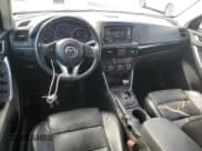 ✅ 2014 Mazda CX-5 Grand Touring • VIN: JM3KE4DY3E0353428 • Lot: 89551725. Listed on Copart with 203,511 mi. Free auction sales archive from the USA and detailed vehicle history report at DreamBid. Image 8.