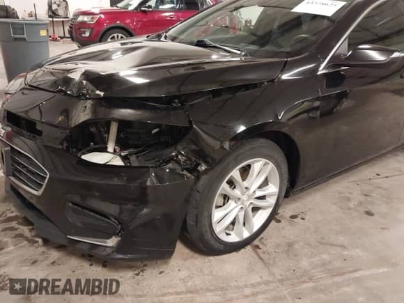 2018 Chevrolet Malibu LT z VIN 1G1ZD5ST4JF263938, wystawiony jako IAAI lot #43378625 z przebiegiem 90 540 mil mil oraz . Historia ofert i sprzedaży dostępna na DreamBid. Obrazek 17.