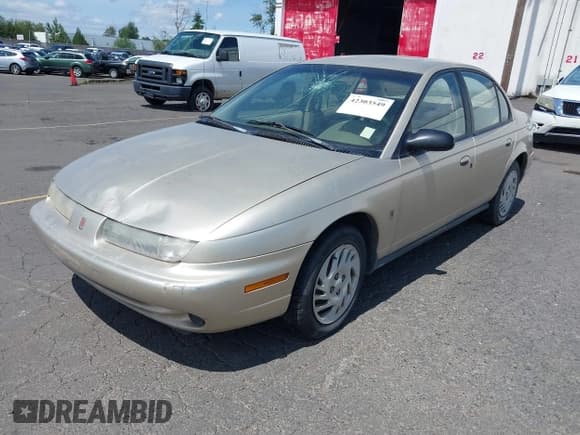 ✅ 1999 Saturn SL • VIN: 1G8ZK5275XZ283178 • Lot: 42303549. Wystawiony na IAAI z przebiegiem 216 776 mil. Bezpłatny archiwum sprzedaży aukcyjnych z USA i szczegółowy raport historii pojazdu na DreamBid. Zdjęcie 2.