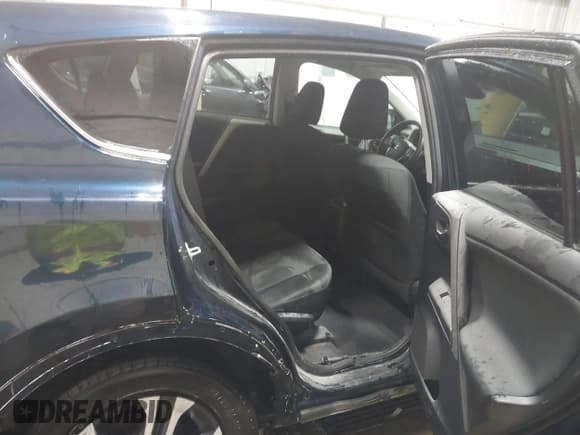 ✅ 2018 Toyota RAV4 LE • VIN: 2T3BFREV6JW767297 • Lot: 43736278. Listed on IAAI with 99,323 mi. Free auction sales archive from the USA and detailed vehicle history report at DreamBid. Image 8.