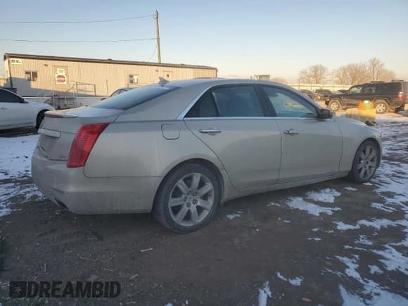 ✅ 2014 Cadillac CTS Premium AWD • VIN: 1G6AZ5S33E0144005 • Lot: 42191675. Listed on Copart with 142,793 mi. Free auction sales archive from the USA and detailed vehicle history report at DreamBid. Image 3.
