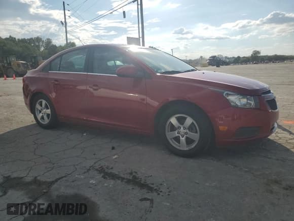 ✅ 2014 Chevrolet Cruze 1LT • VIN: 1G1PC5SB5E7246261 • Lot: 84279655. Listed on Copart with 64,988 mi. Free auction sales archive from the USA and detailed vehicle history report at DreamBid. Image 4.