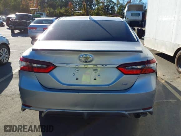 2022 Toyota Camry SE z VIN 4T1G11AKXNU712139, wystawiony jako IAAI lot #43506666 z przebiegiem 13 941 mil mil oraz . Historia ofert i sprzedaży dostępna na DreamBid. Obrazek 16.