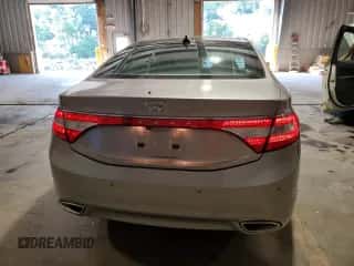 2013 Hyundai Azera z VIN KMHFH4JG4DA220775, wystawiony jako Copart lot #70571744 z przebiegiem 64 643 mil mil oraz Szkoda całkowita • Salvage title. Historia ofert i sprzedaży dostępna na DreamBid. Obrazek 6.