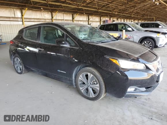 ✅ 2018 Nissan LEAF SL • VIN: 1N4AZ1CP6JC313942 • Lot: 67787965. Listed on Copart with 57,254 mi. Free auction sales archive from the USA and detailed vehicle history report at DreamBid. Image 4.
