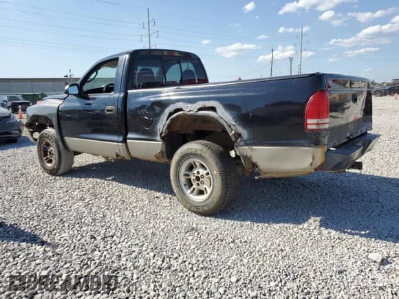 2000 Dodge Dakota Sport z VIN 1B7GG26N7YS667611, wystawiony jako Copart lot #71181355 z przebiegiem 218 471 mil mil oraz Szkoda całkowita • Salvage title. Historia ofert i sprzedaży dostępna na DreamBid. Obrazek 2.