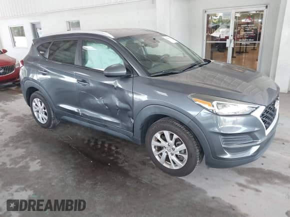2019 Hyundai Tucson Value with VIN KM8J33A4XKU862390, listed as a IAAI auction lot 42769145 with 119,632 mi miles and . Bid and sale history available at DreamBid. Image 1.