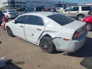 2012 Chevrolet Malibu LTZ with VIN 1G1ZG5E7XCF267663, listed as a IAAI auction lot 43282949 with 161,832 mi miles and . Bid and sale history available at DreamBid. Image 3.
