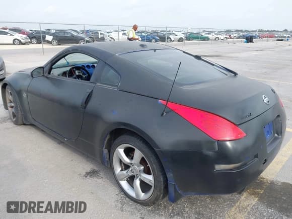 ✅ 2006 Nissan 350Z Touring • VIN: JN1AZ34D06M301977 • Лот: 42142187. Опубликован ранее на IAAI с пробегом 165 336 миль. Бесплатный доступ к архиву аукционных продаж из США и подробный отчёт об истории автомобиля на DreamBid. Изображение 3.