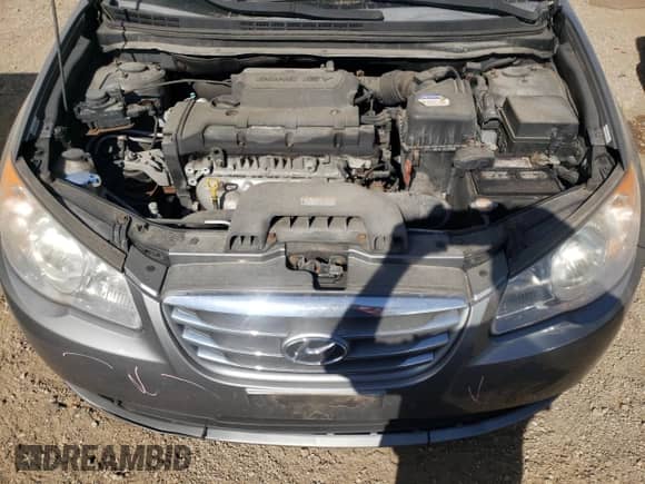 2010 Hyundai Elantra GLS z VIN KMHDU4ADXAU177594, wystawiony jako Copart lot #70050154 z przebiegiem 85 334 mil mil oraz Szkoda całkowita • Salvage title. Historia ofert i sprzedaży dostępna na DreamBid. Obrazek 11.