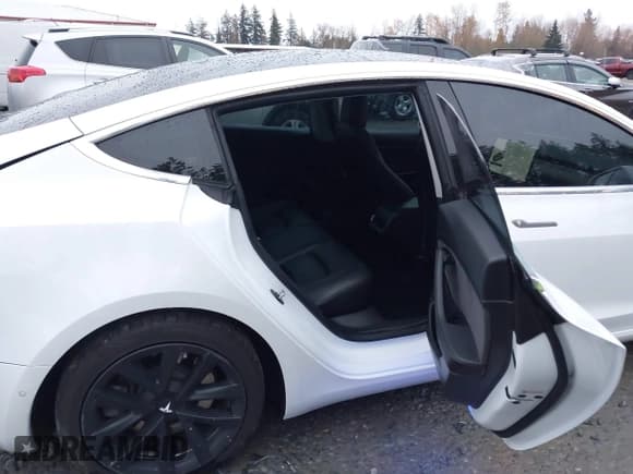 ✅ 2020 Tesla Model 3 Standard Range Plus • VIN: 5YJ3E1EA7LF799447 • Лот: 43752660. Опубликован ранее на IAAI с пробегом 63 864 миль. Бесплатный доступ к архиву аукционных продаж из США и подробный отчёт об истории автомобиля на DreamBid. Изображение 8.