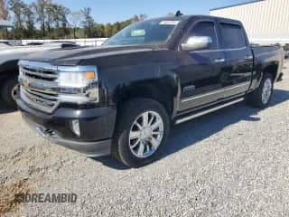 2016 Chevrolet Silverado 1500 High Country с VIN 3GCUKTEJ3GG118984, выставлен на аукционе Copart как лот 76847704 с пробегом 61 816 миль миль и Списание • Salvage title. История ставок и продаж доступна на DreamBid. Изображение 1.