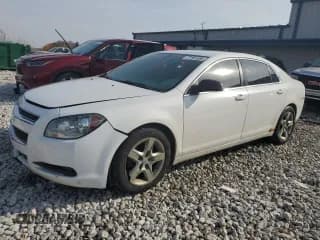 ✅ 2012 Chevrolet Malibu 1FL • VIN: 1G1ZA5E07CF347054 • Lot: 77101584. Listed on Copart with 153,973 mi. Free auction sales archive from the USA and detailed vehicle history report at DreamBid. Image 1.