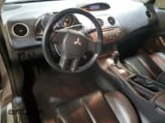 ✅ 2008 Mitsubishi Eclipse GS • VIN: 4A3AK64FX8E032921 • Lot: 81477594. Wystawiony na Copart z przebiegiem 103 833 mil. Bezpłatny archiwum sprzedaży aukcyjnych z USA i szczegółowy raport historii pojazdu na DreamBid. Zdjęcie 8.