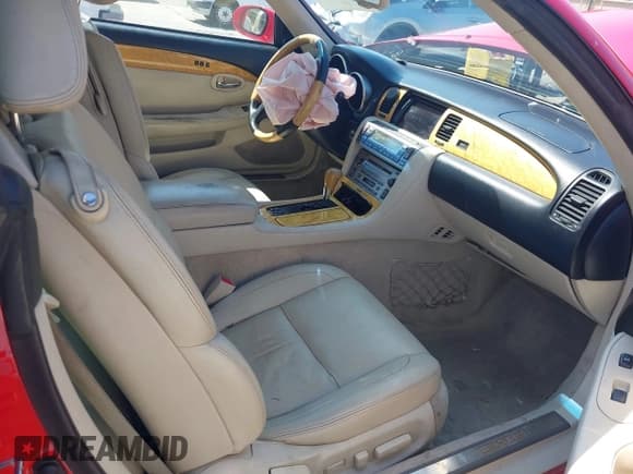 ✅ 2004 Lexus SC 430 • VIN: JTHFN48Y440058288 • Lot: 43205275. Listed on IAAI with 202,281 mi. Free auction sales archive from the USA and detailed vehicle history report at DreamBid. Image 5.