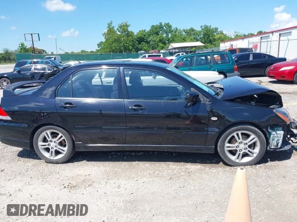 ✅ 2005 Mitsubishi Lancer Ralliart • VIN: JA3AJ66F05U020912 • Lot: 42663717. Wystawiony na IAAI z przebiegiem 172 445 mil. Bezpłatny archiwum sprzedaży aukcyjnych z USA i szczegółowy raport historii pojazdu na DreamBid. Zdjęcie 13.